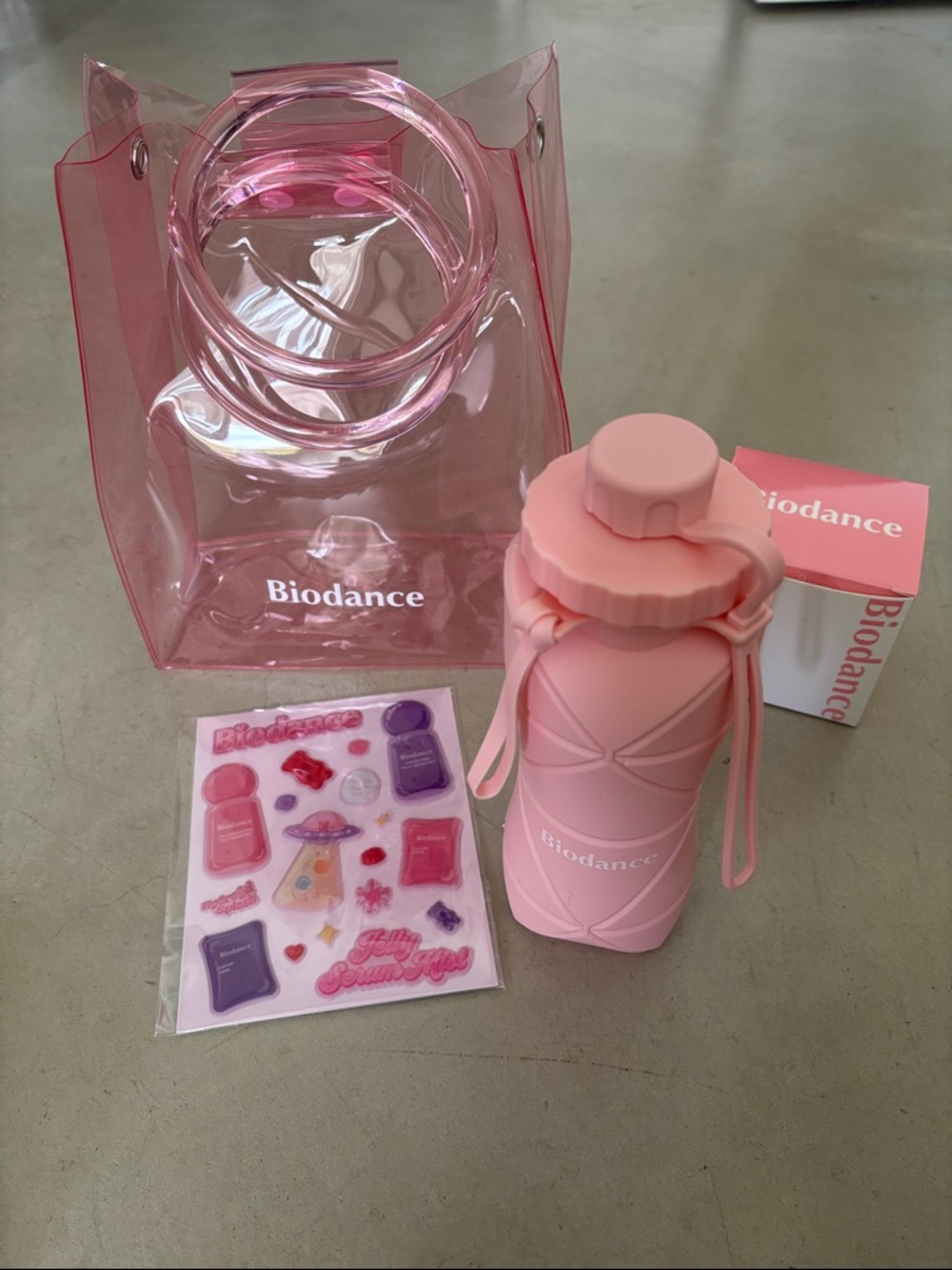 Sale Biodance Silicone Collapsable Water Bottle, clear Tote, & puffy sticker set